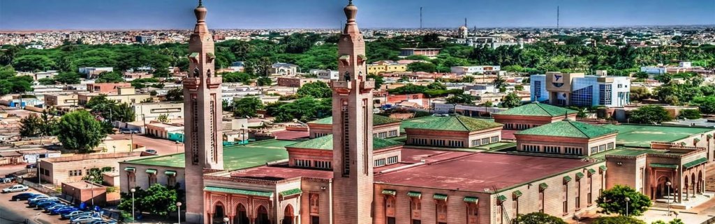 How urbanization and climate change exacerbate the risk of flooding in Mauritania, according to the World Bank